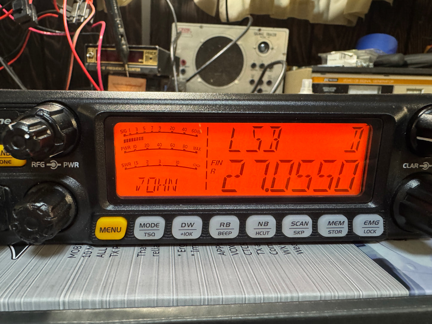 Radio communication device with digital display on a cluttered background