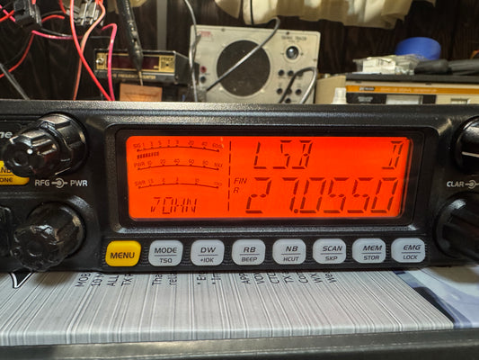 Radio communication device with digital display on a cluttered background