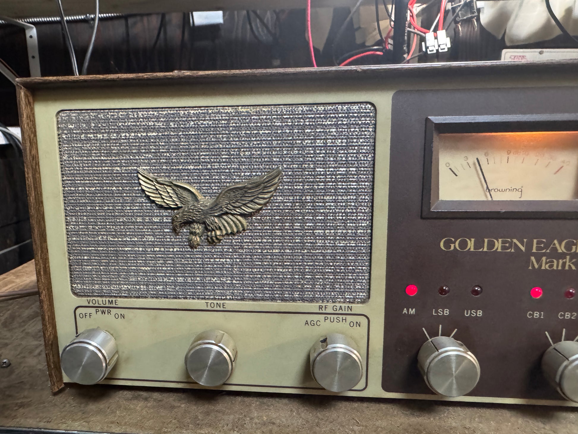 Vintage radio with Golden Eagle branding on a worn surface
