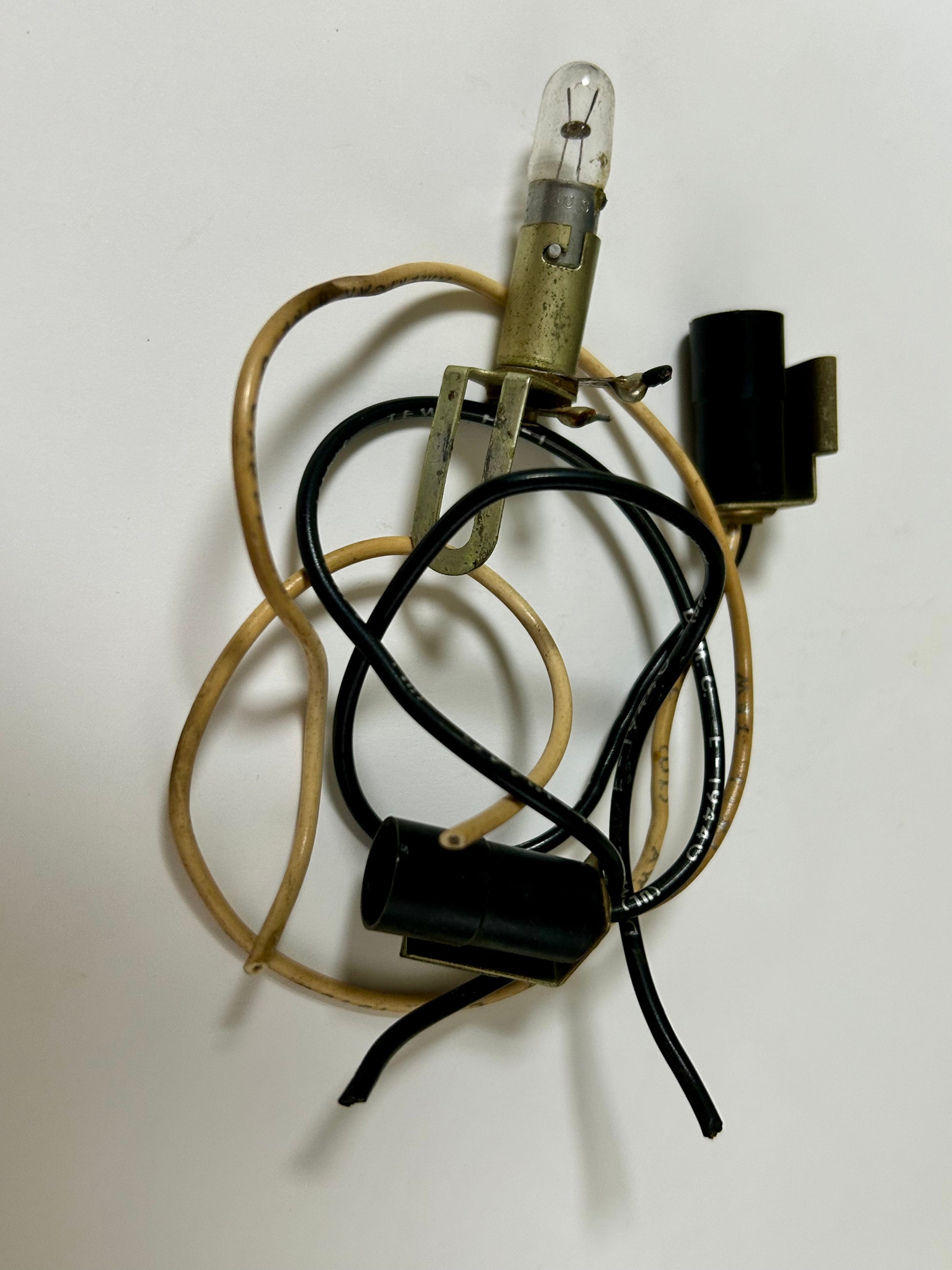 Light bulb with wiring on a white background