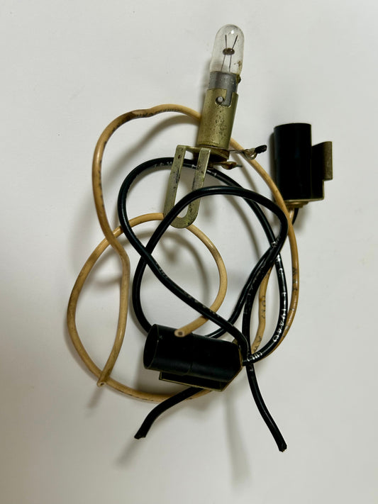 Light bulb with wiring on a white background