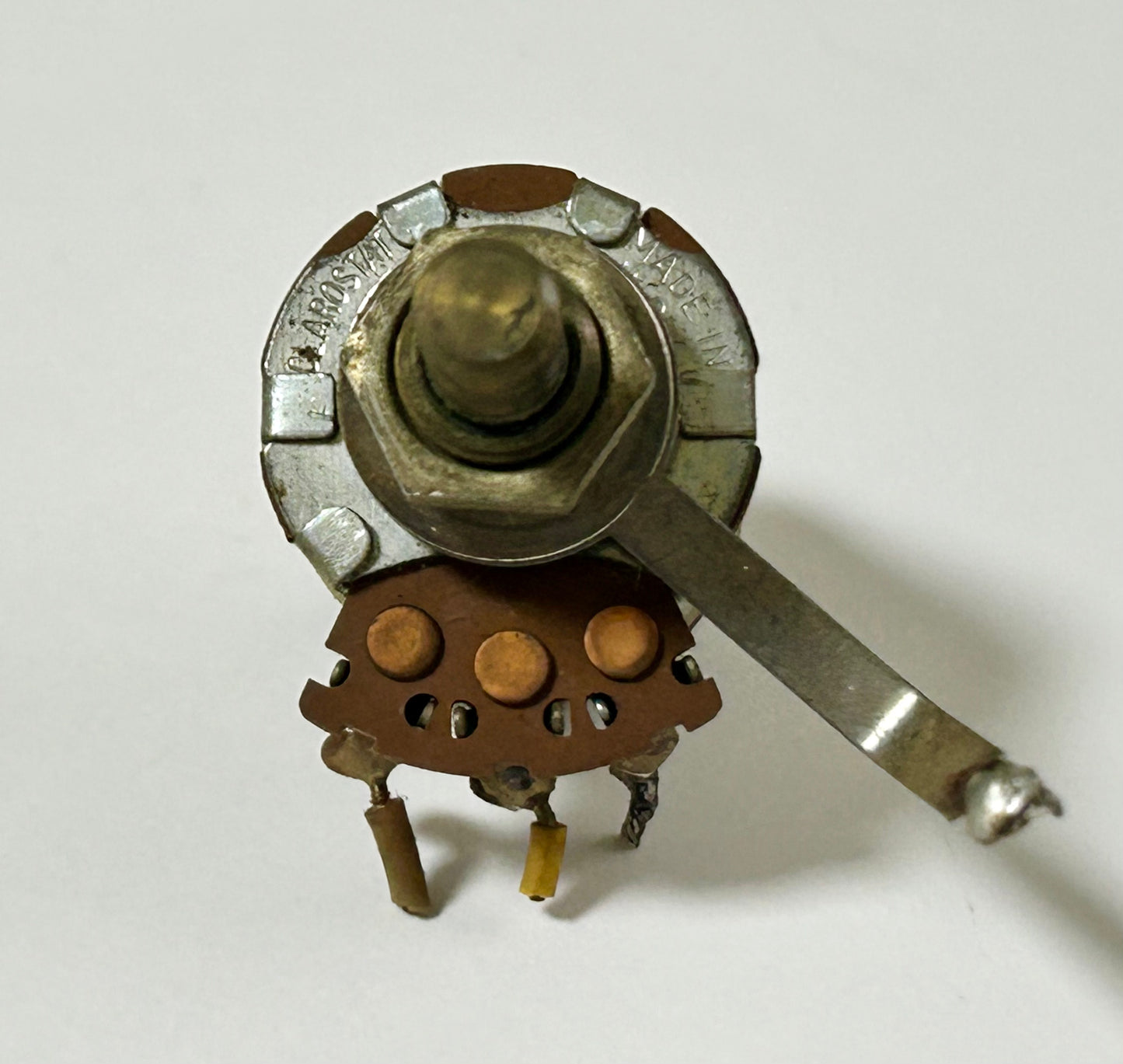 Mechanical potentiometer on a white background