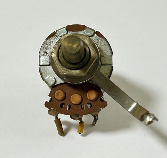 Mechanical potentiometer on a white background