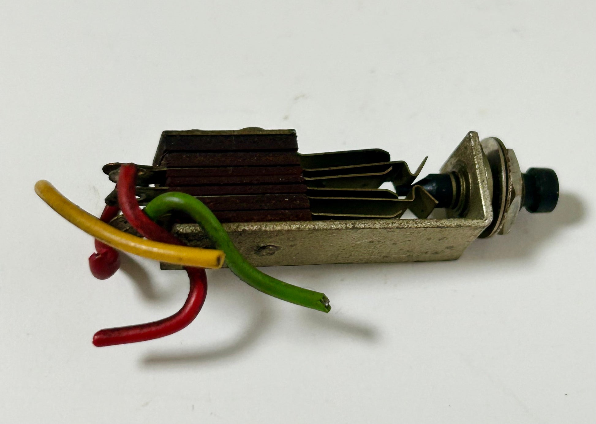 Electrical component with colored wires on a white background