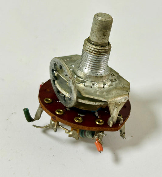 Mechanical potentiometer on a white background