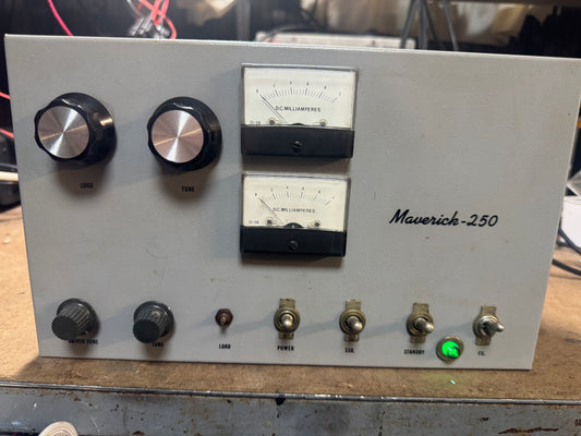 Vintage electronic device with dials and indicators labeled 'Maverick-250'.