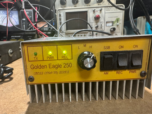 Radio receiver with 'Golden Eagle 250' branding on a technical setup background