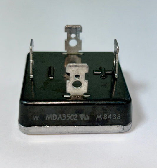 Electrical component with metallic contacts on a white background