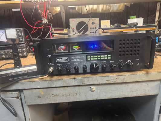Radio receiver with digital display on a metal surface